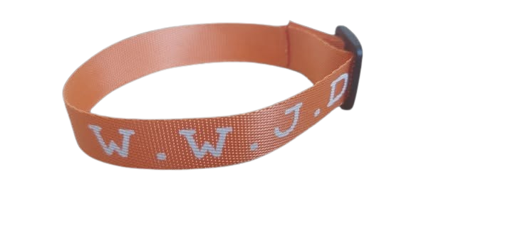 Orange WWJD wristband on a white background – 100% of profits support UK street‑church outreach